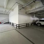 Vue intérieure du parking après intervention – structure support et garde corps métalliques vérifiés in situ par AXIOLIS